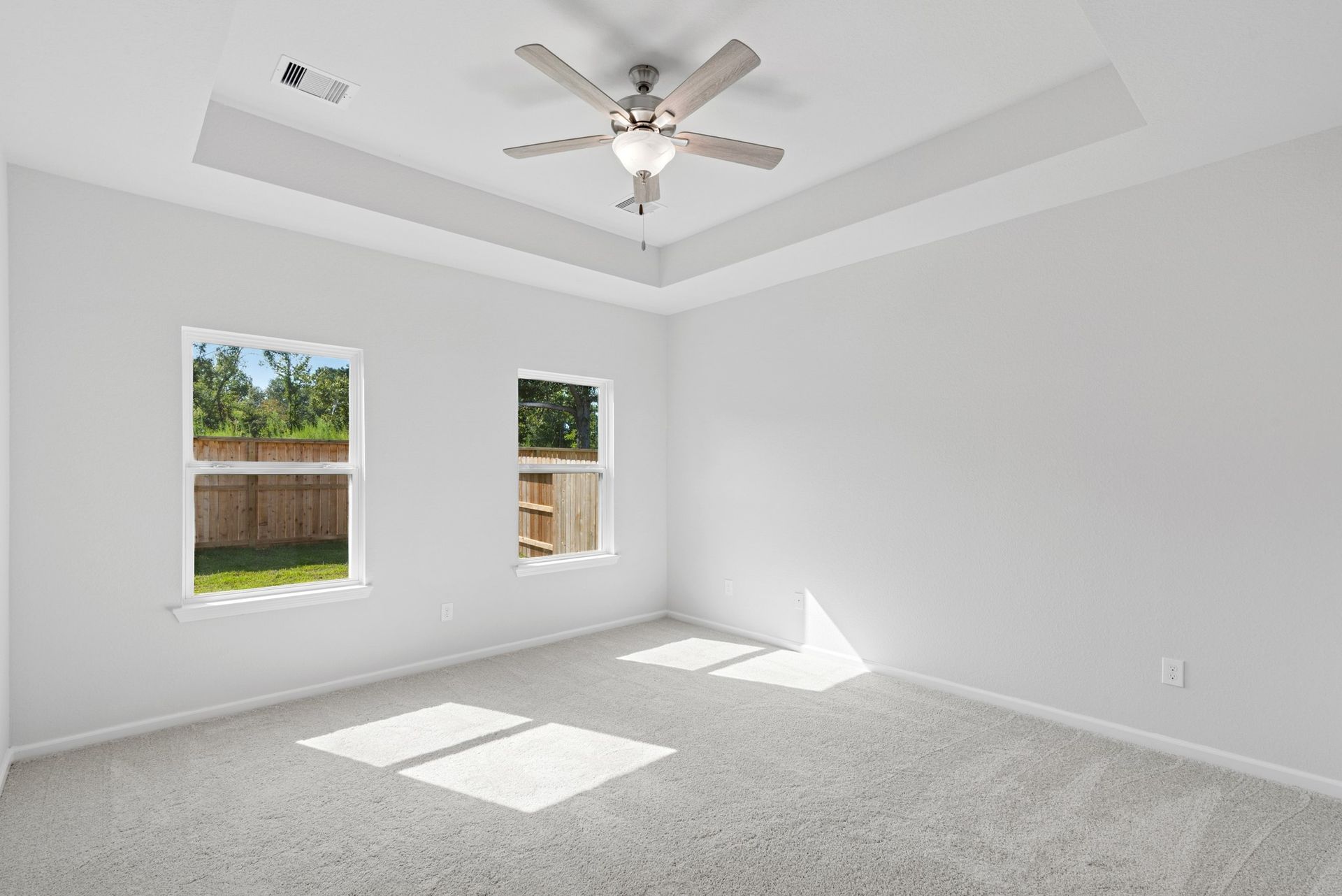 The Sparrow II- Primary Suite, Tray Ceiling not Included. Sample floor plan image for illustration; upgrades, options, and colors may vary.