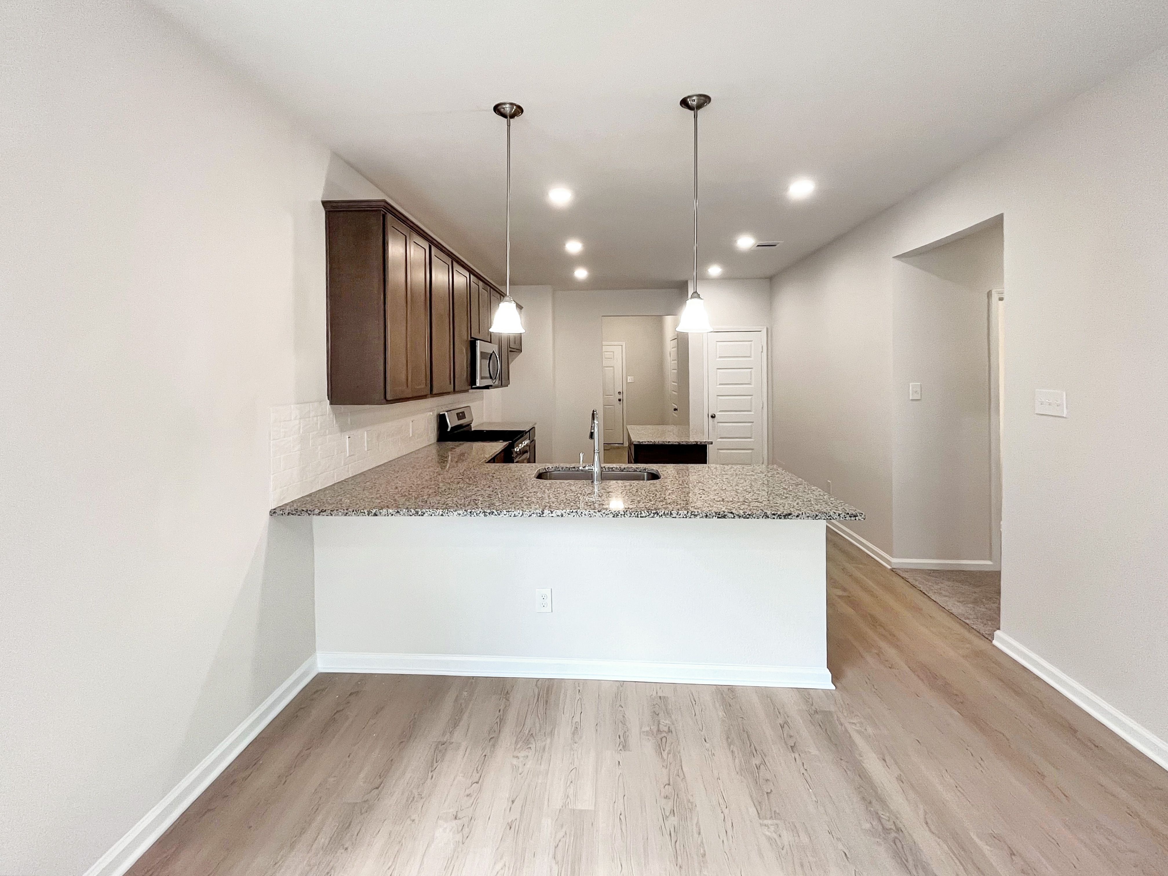 The Cardinal II- Breakfast Area into Kitchen