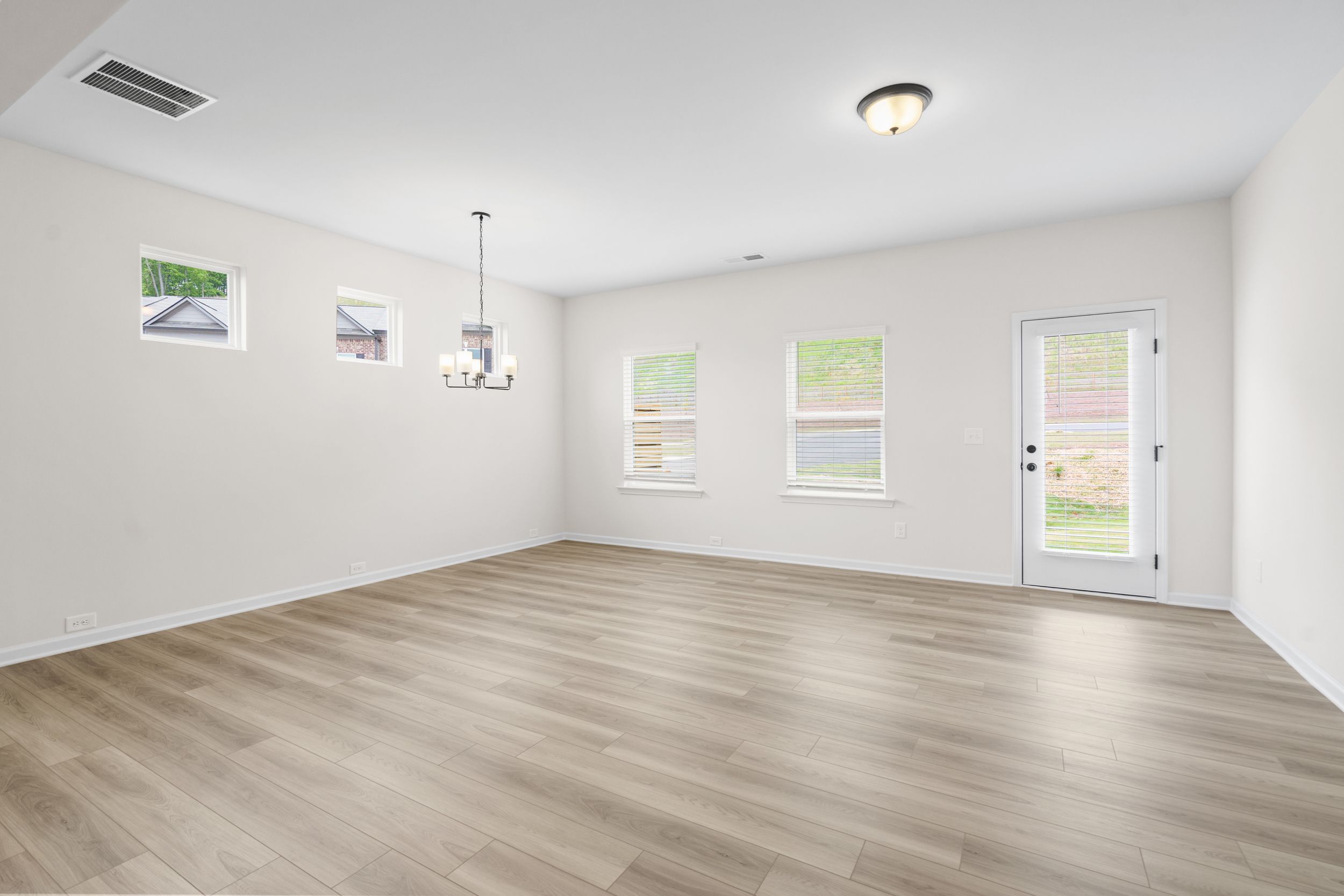 The Suwanee- Open Dining and Family Area