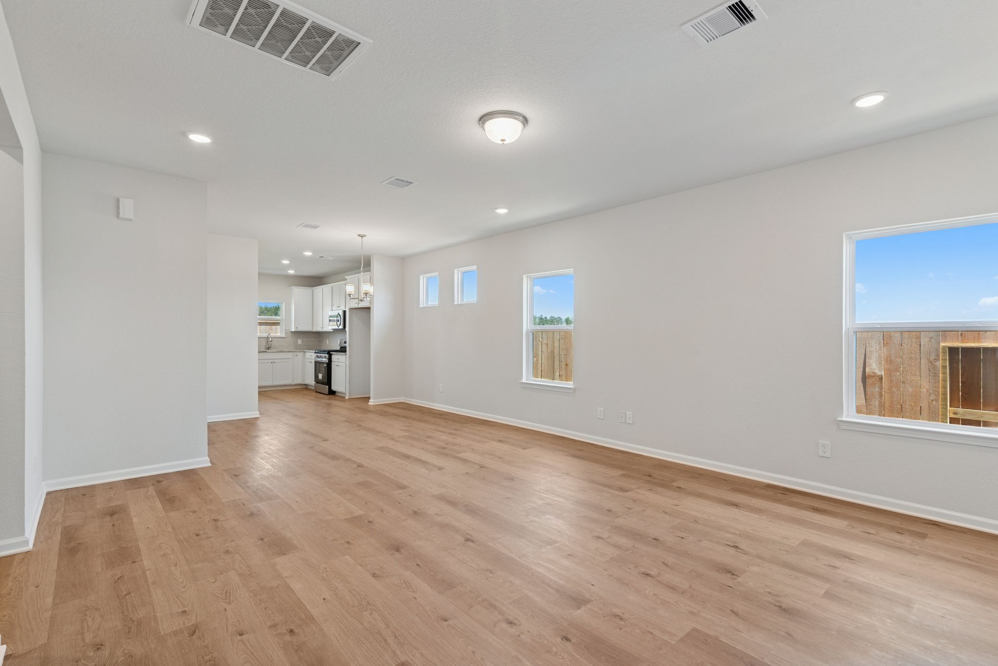 The Blue Jay II- Family Room into the Dining Area and Kitchen