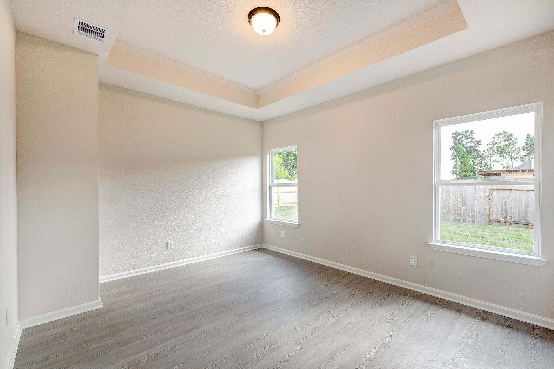 The Davenport II Primary Bedroom with Tray Ceiling