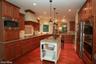 casa en Sockness Builders, Inc. por Sockness Builders, Inc.