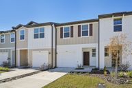 Clinton Townhomes por Starlight Homes en Tampa-St. Petersburg Florida