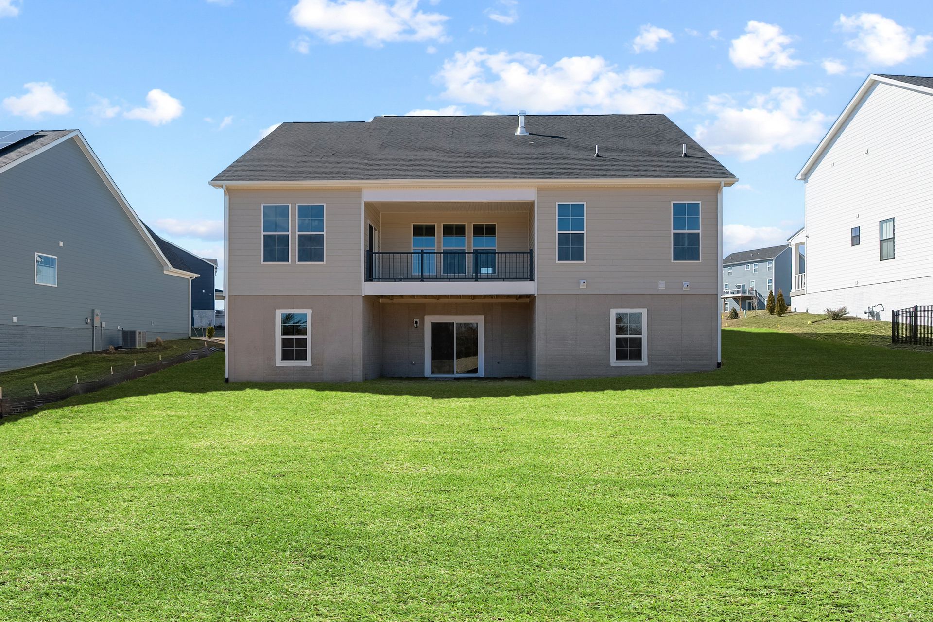 Rear Facade, Covered Back Porch, & Walk Out Lower Level