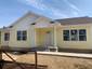 casa en Strouss Construction por Strouss Construction