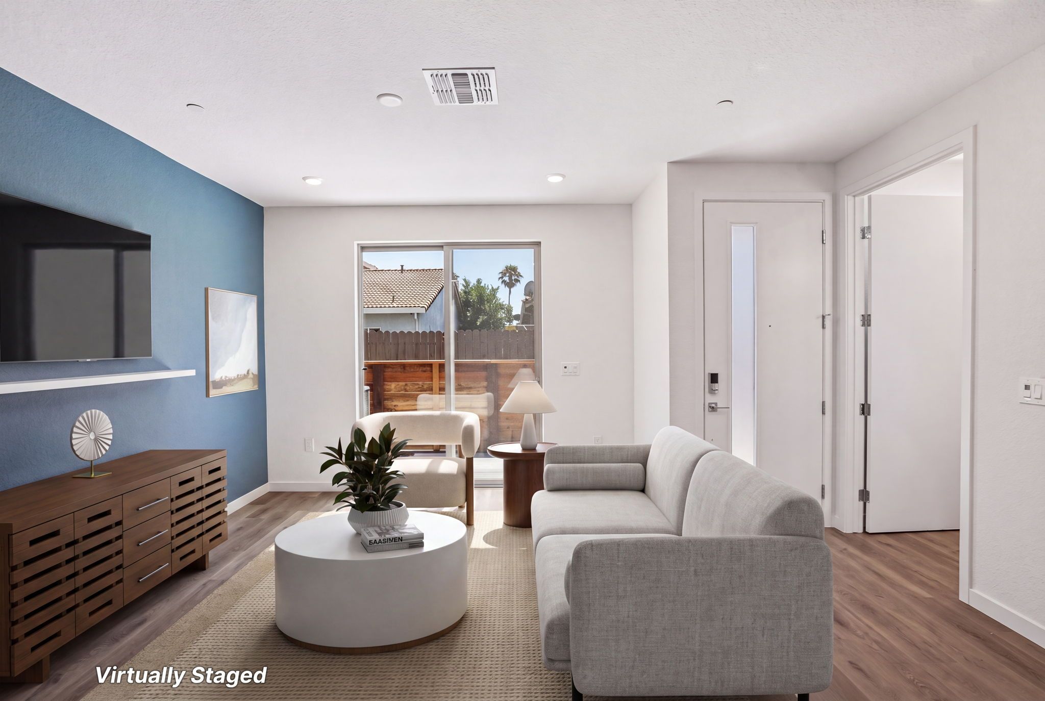 Photo has been digitally altered to show how this space could be used. To see the original, unaltered photo without digital staging, please see next image.