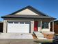 casa en Thompson Construction, Inc. por Thompson Construction, Inc.