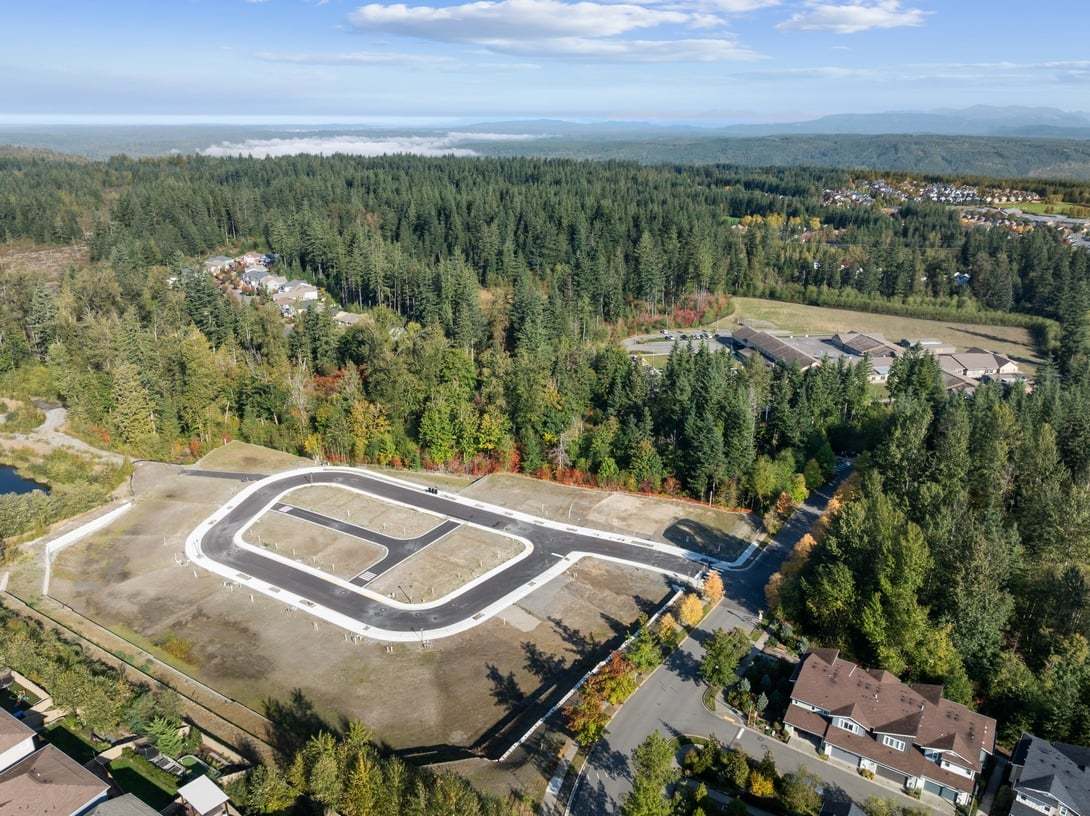 Surrounded by protected, wooded green space