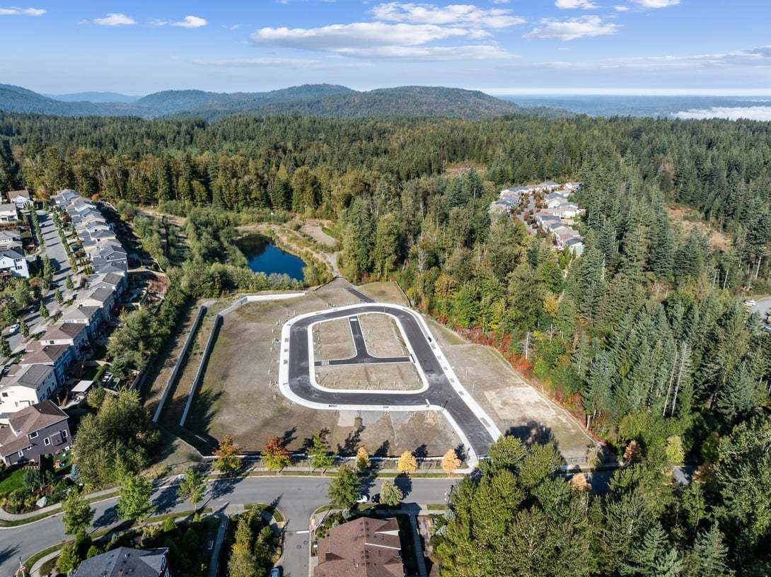 Surrounded by protected, wooded green space