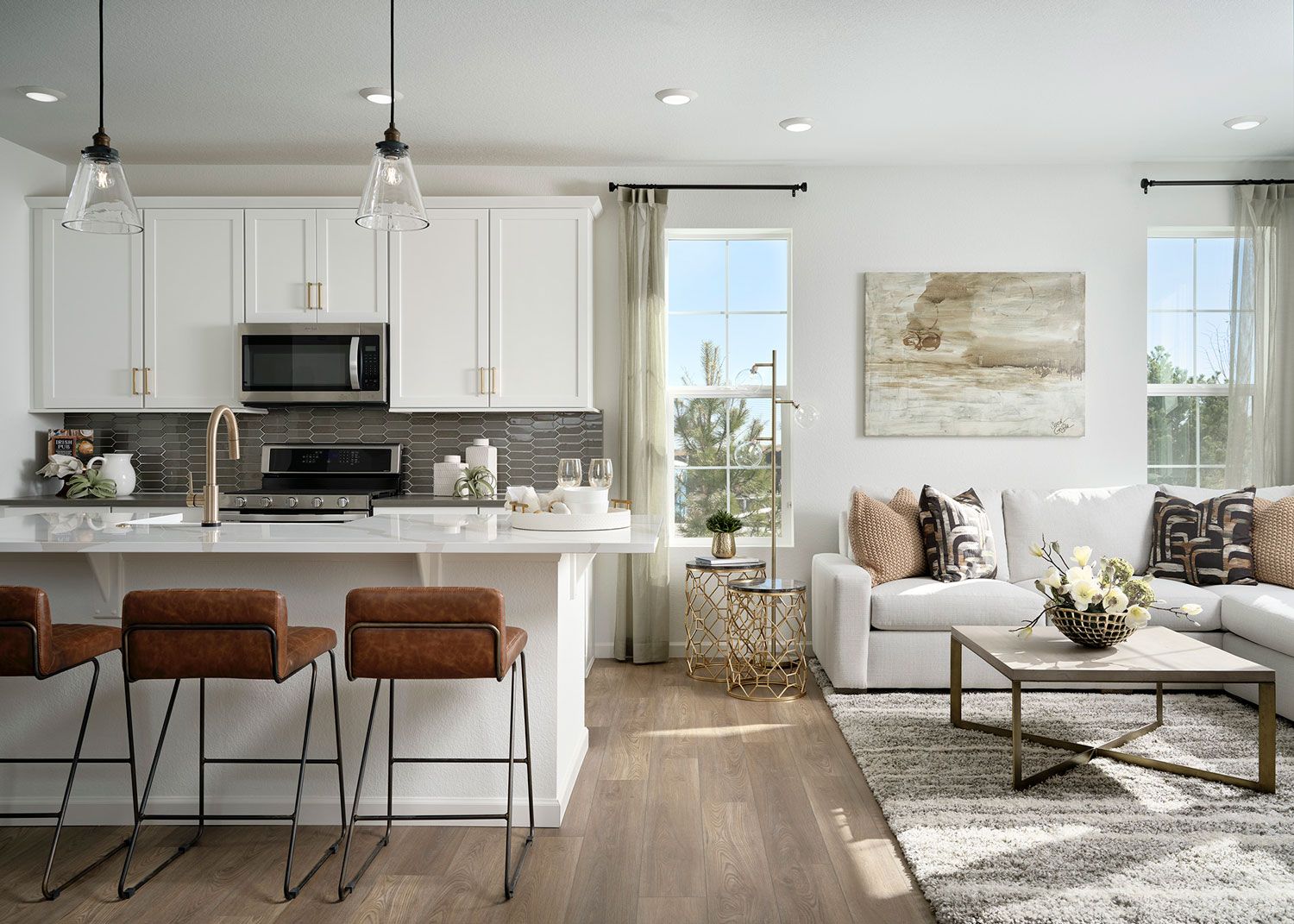 Kitchen and great room with laminate wood flooring