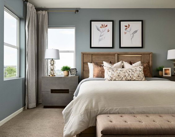 Unwind in a spa-like primary bedroom outfitted with expansive windows