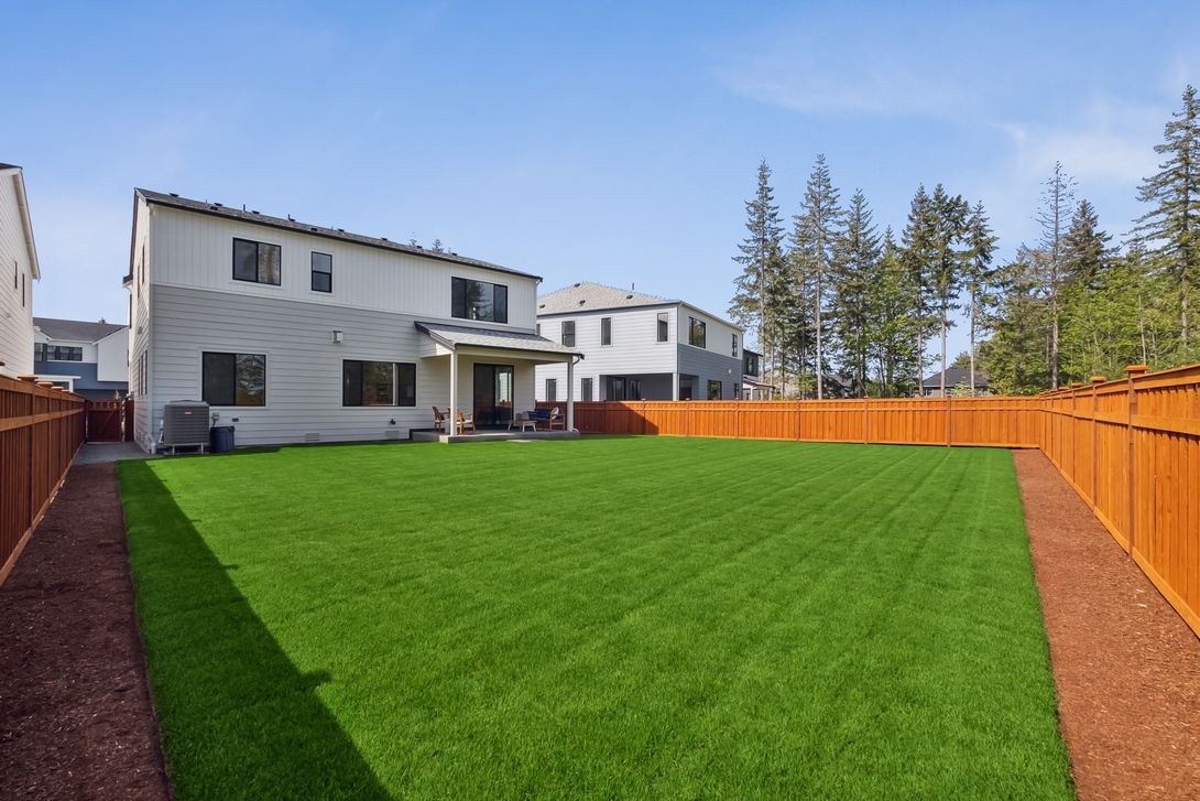 Covered Rear Patio and Fenced Rear Yard