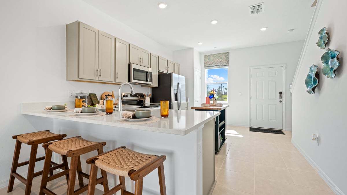Ivy Model - The Towns at Skye Ranch-10 kitchen