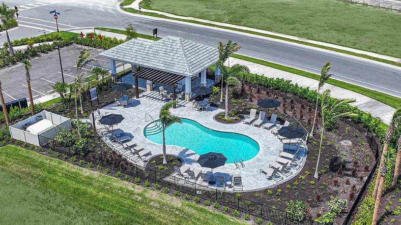 Townhomes at Skye Ranch  5380-pool aerial 16x9