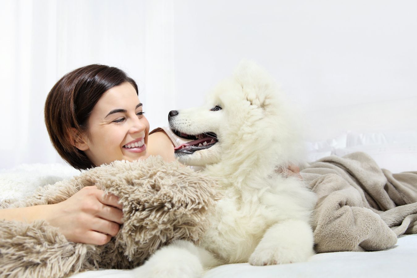 Woman with Samoyed Pup
