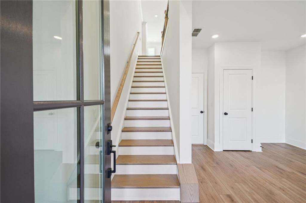 Private entry leads to bonus room on terrace level.