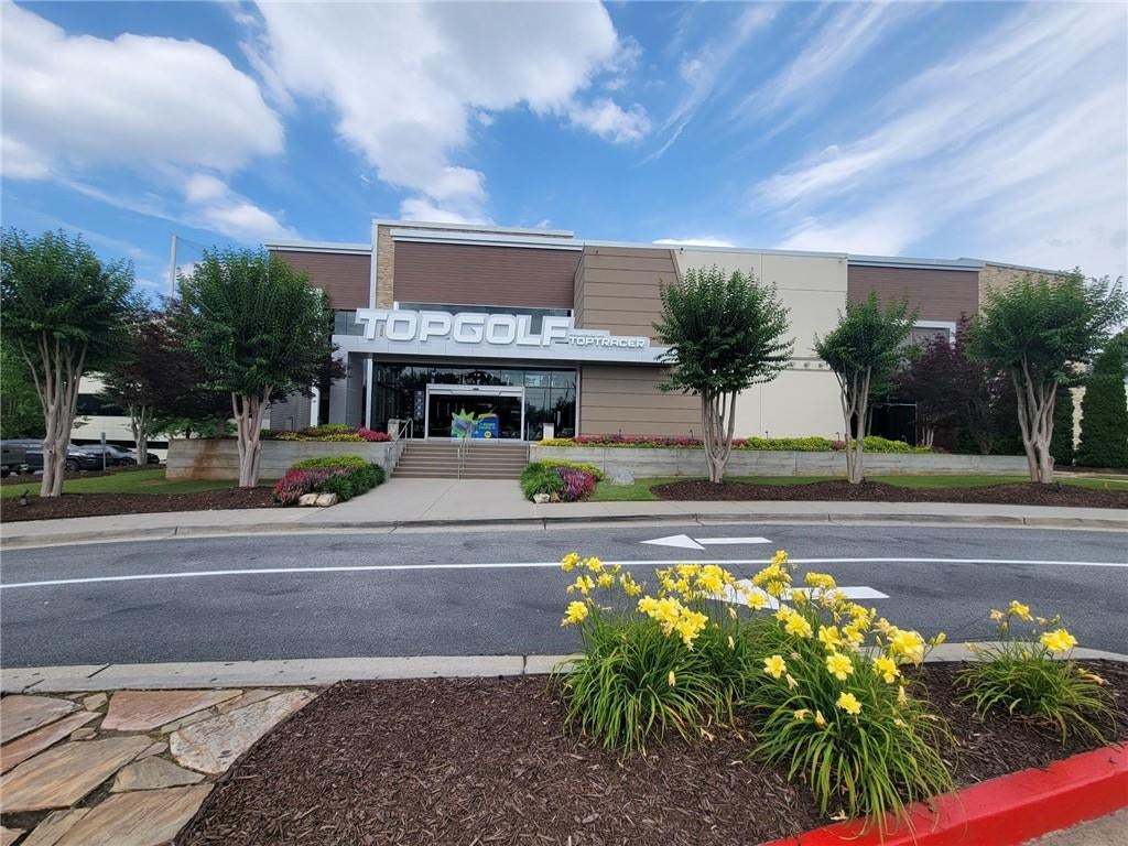 Located next door to TopGolf!