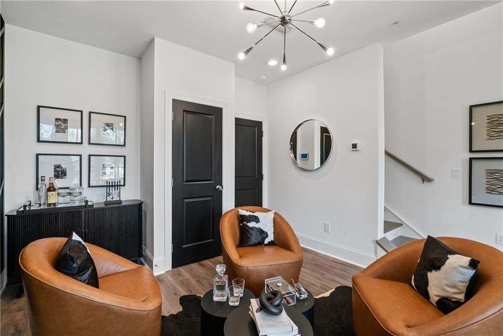 Bonus room/sitting room with sliding glass doors leading to your private, covered patio. *Photos are not the actual unit, but of the same floor plan and decorated model home.