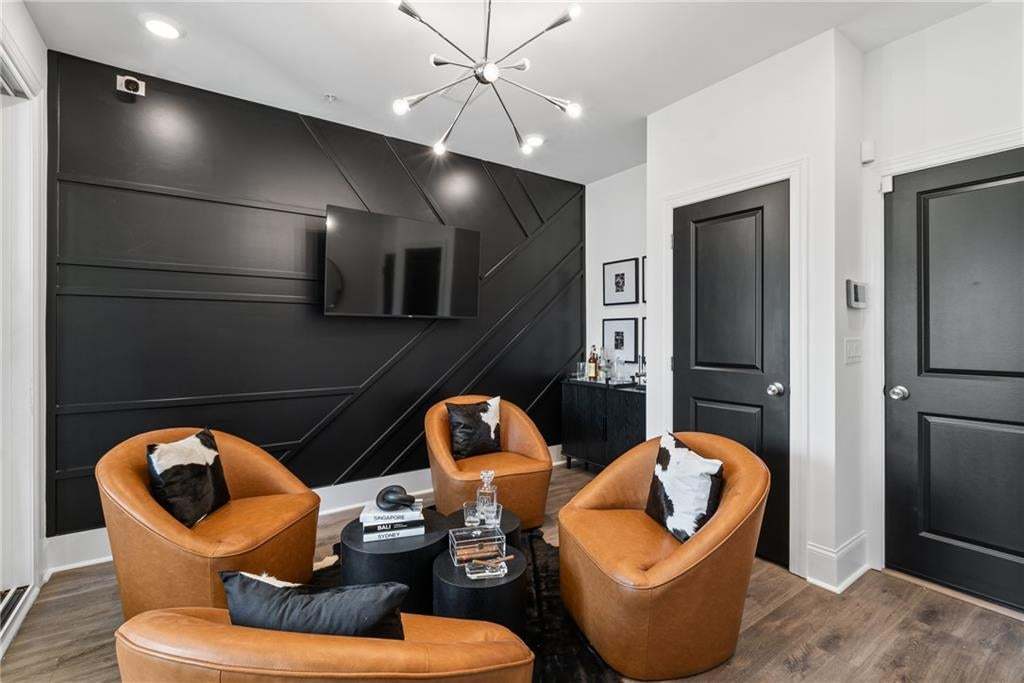 Main Entry featuring an Office / media Room , behind the doo is the 1 car garage . Not the actual unit or building
