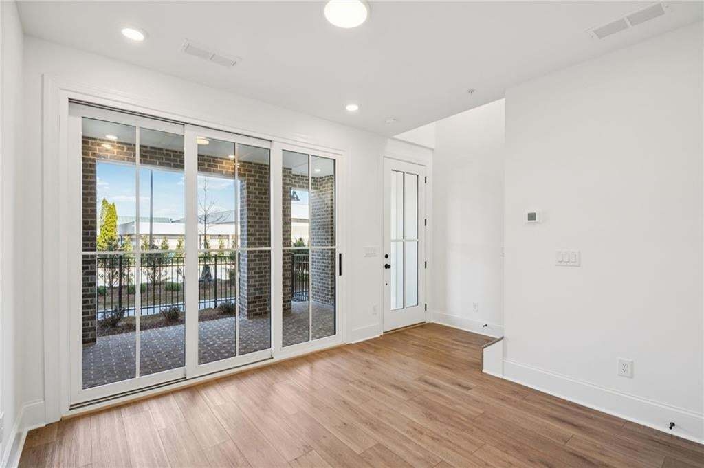 Beautiful sliding glass doors lead to covered patio.