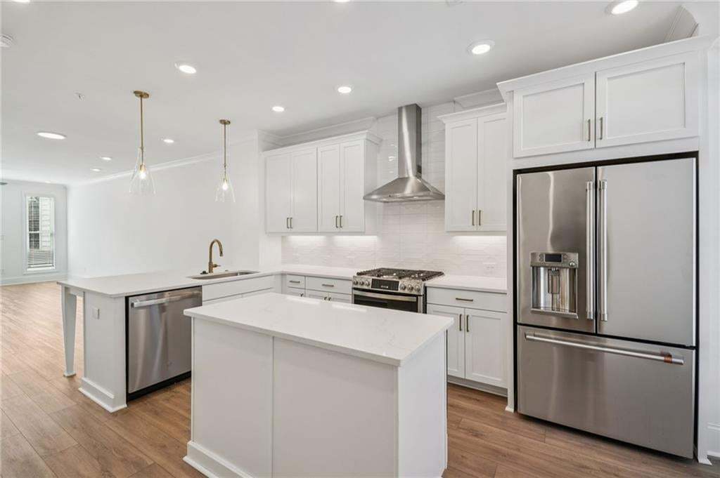 All stainless steel appliances included! White cabinets and quartz countertops.