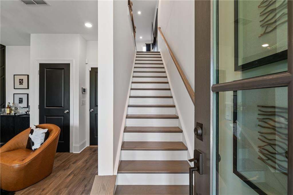 Spacious Living Room with a french door leading to the wooden deck , not the actual unit or building