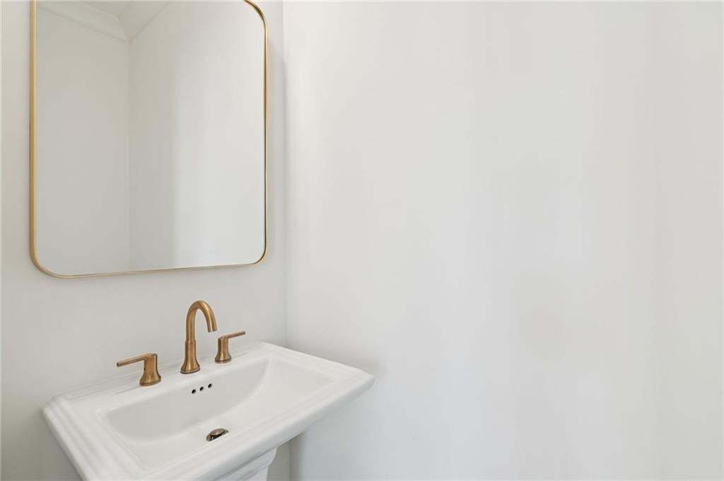 Powder Room off of Sunroom.