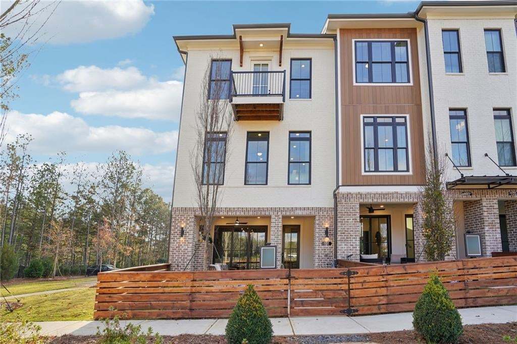 End Unit Front Entry with a private yard and fence . Not the actual unit or building