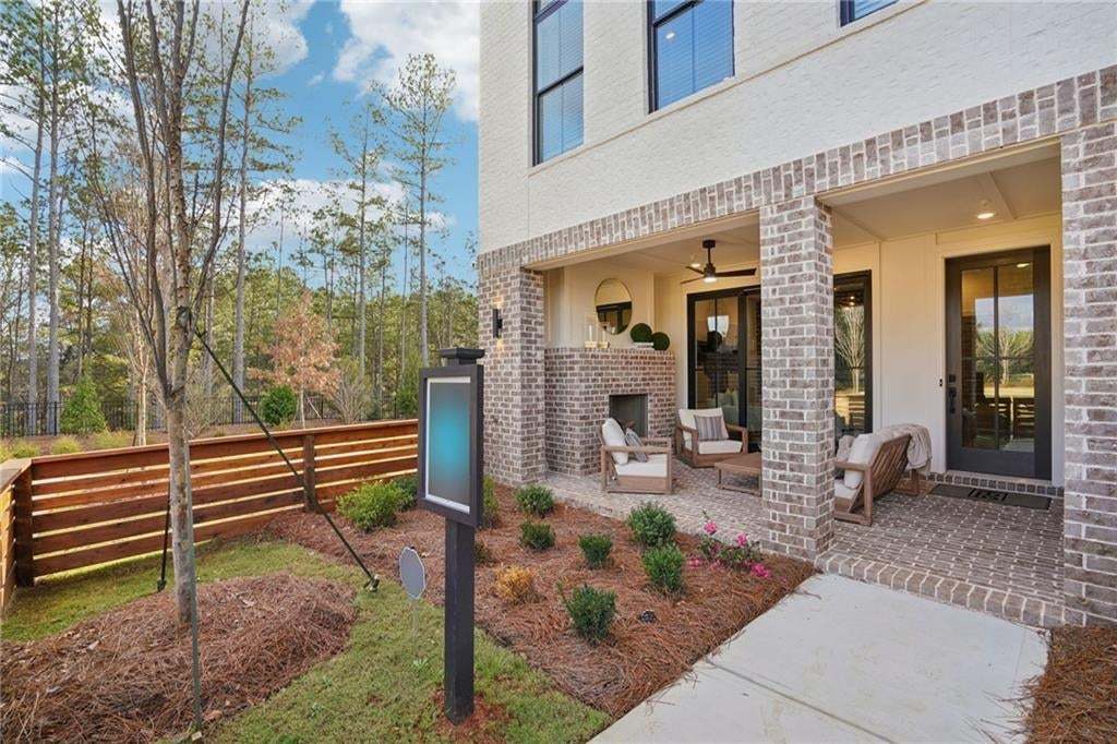 Main Entry with a terrace and private yard . Not the actual building or unit