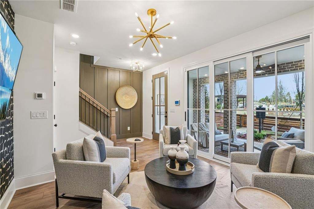 As you go in you enter into a Media Room / Office with a view facing the green common area and the Firepit . Not the actual building or unit