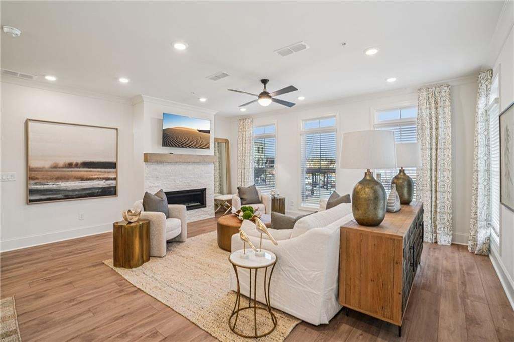 Open Concept Living Room with plenty natural light . Not the actual building or unit