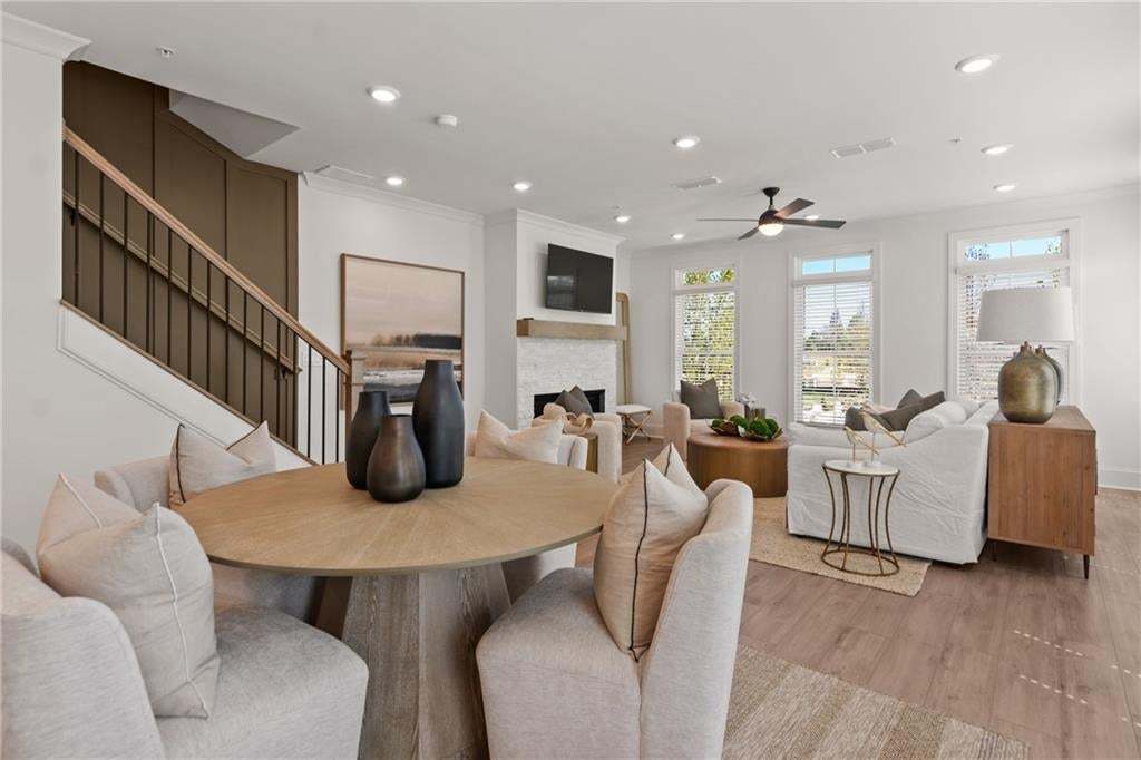 Open concept living/dining room. *Photos are not the actual unit. Decorated model home photos used.