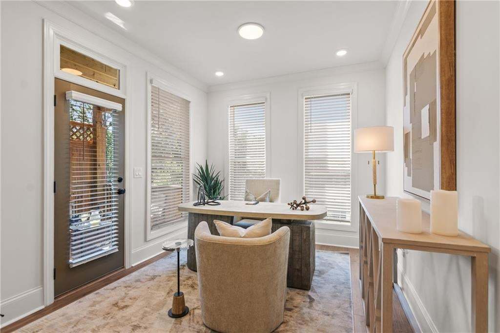 Sunroom can also be used as a home office. *Photos are not the actual unit. Decorated model home photos used.