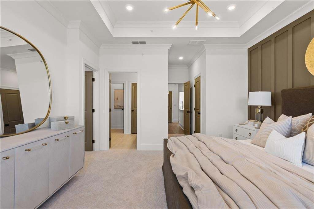 Owner's suite with ensuite bathroom and 2 spacious closets. *Photos are not the actual unit. Decorated model home photos used.