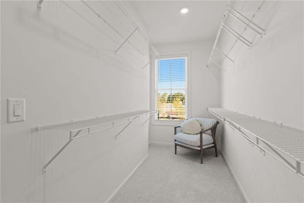 Oversized closet in owner's suite. *Photos are not the actual unit. Decorated model home photos used.