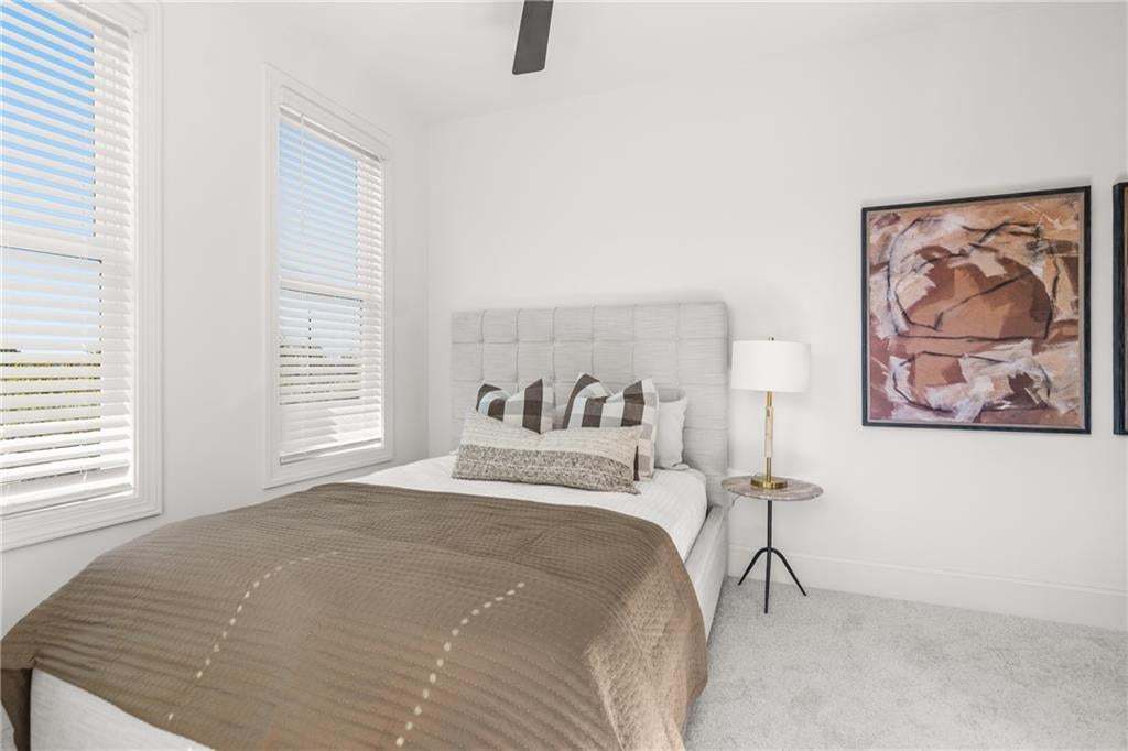 Secondary bedroom on third floor. *Photos are not the actual unit. Decorated model home photos used.