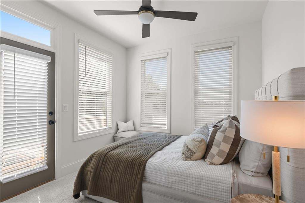 Secondary bedroom on third floor. *Photos are not the actual unit. Decorated model home photos used.