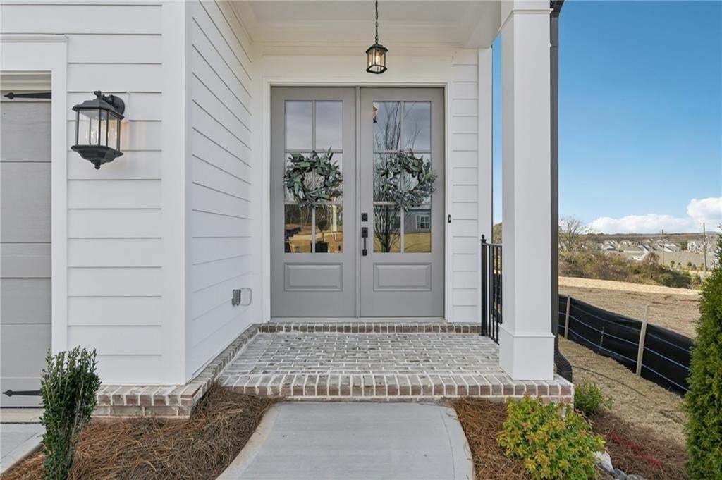 Beautiful double doors on the Carter.  Photo not of actual home but for representation purposes only.