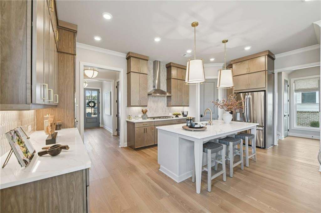 At your design appointment you can select your cabinets, flooring, lighting, countertops, etc.  Photo not of actual home but for representation purposes only.