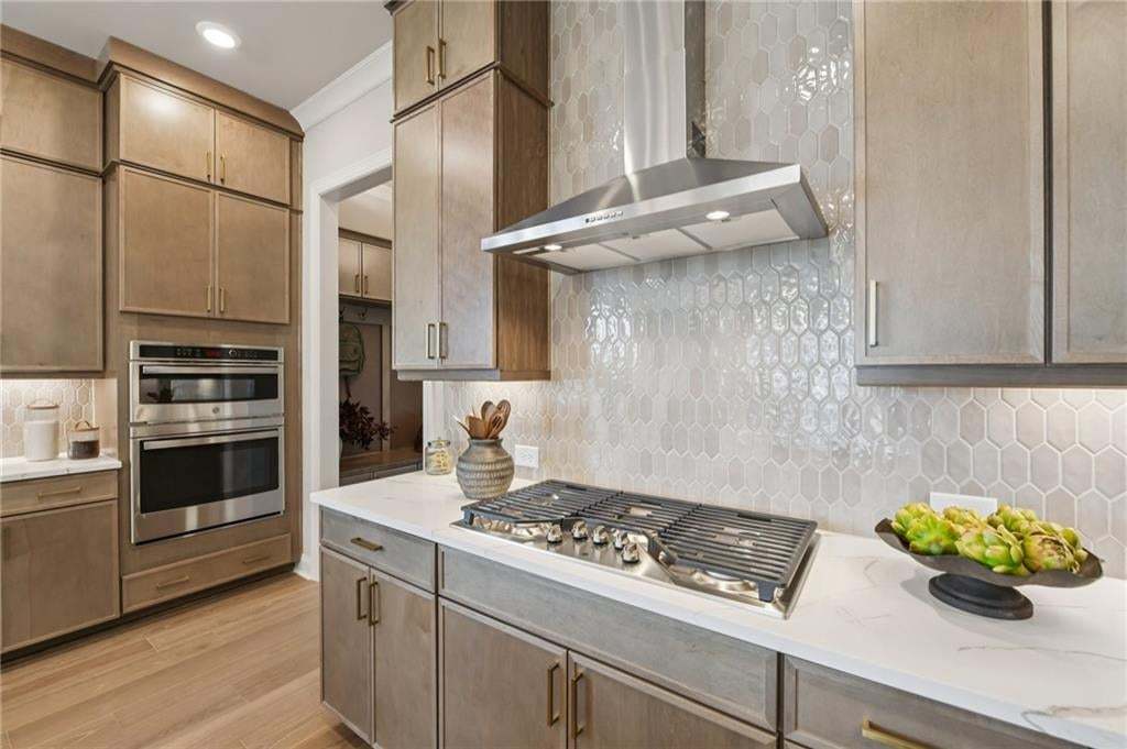 GE stainless steel appliances.  Photo not of actual home but for representation purposes only.