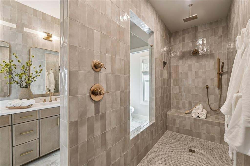 Our walk-in shower with drying station is amazing!! Photo not of actual home but for representation purposes only.
