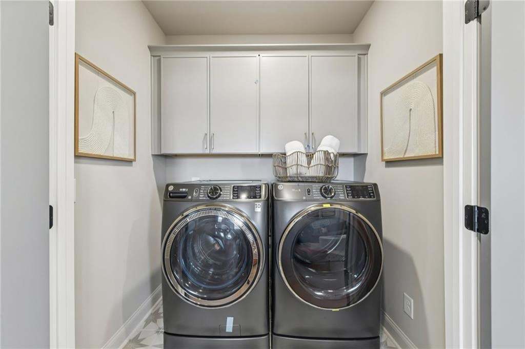 Laundry room conveniently located upstairs. Photo not of actual home but for representation purposes only.