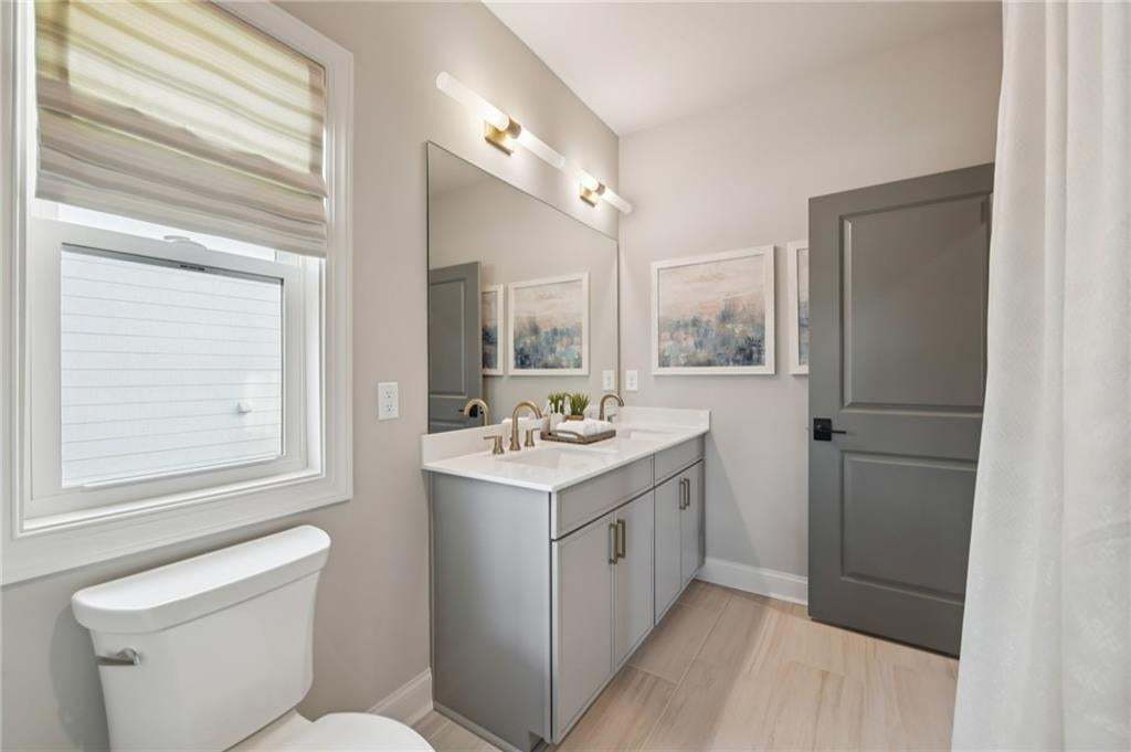 En suite for one of the upstairs bedrooms. Photo not of actual home but for representation purposes only.