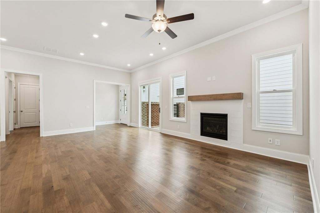 Living room opens to casual dining and kitchen. Perfect space to hang out