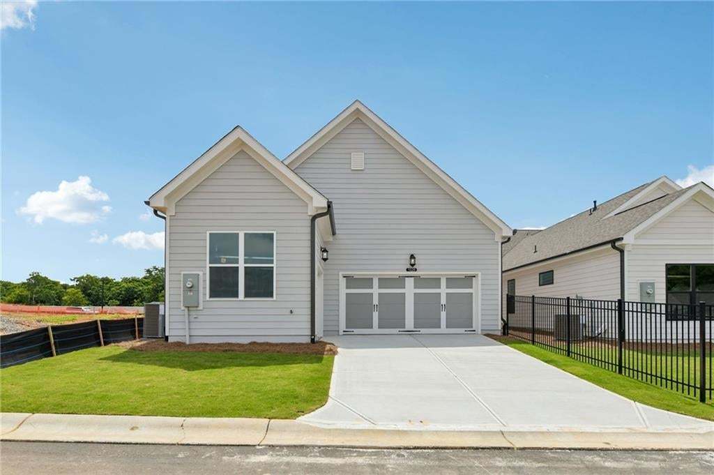 The McDaniel is part of the Arden collection.  The garage is rear entry and has a saddle garage for extra storage or a golf cart!