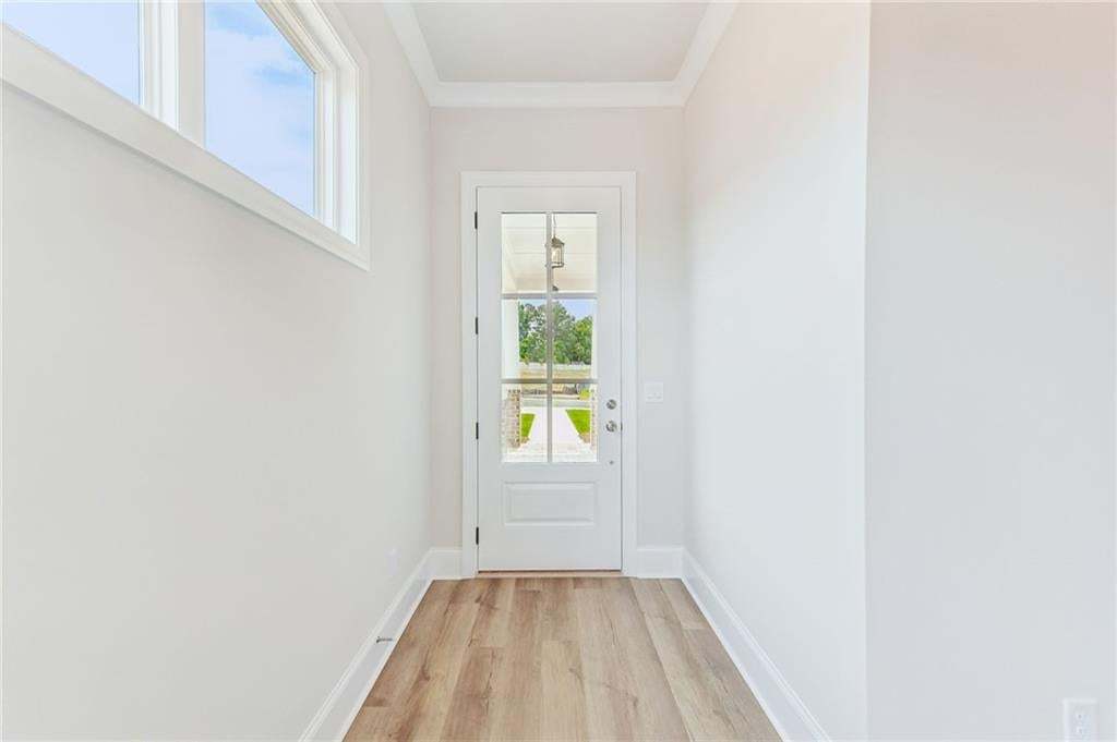 Nice entry hall that provides space for your favorite hall table, pictures, etc.  Come see this move in ready home!!