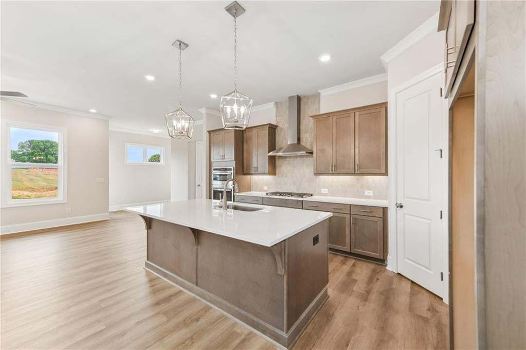 The cabinets in this home are stylish and ample. Pantry provides plenty of storage space.