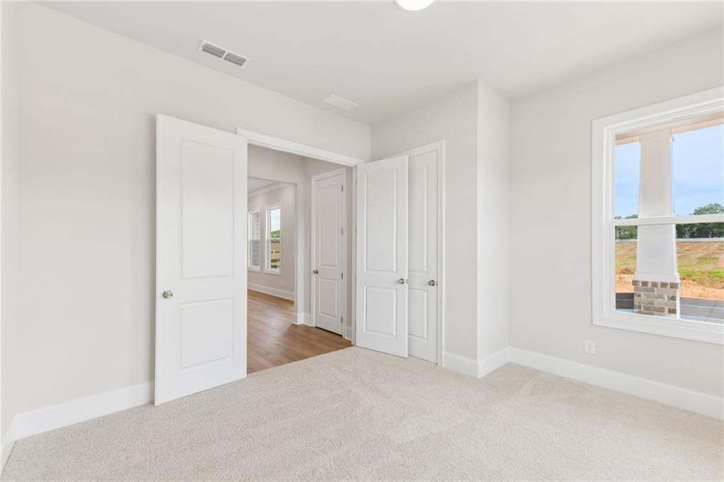 Double doors open to this spacious bedroom or office space located on main floor!!