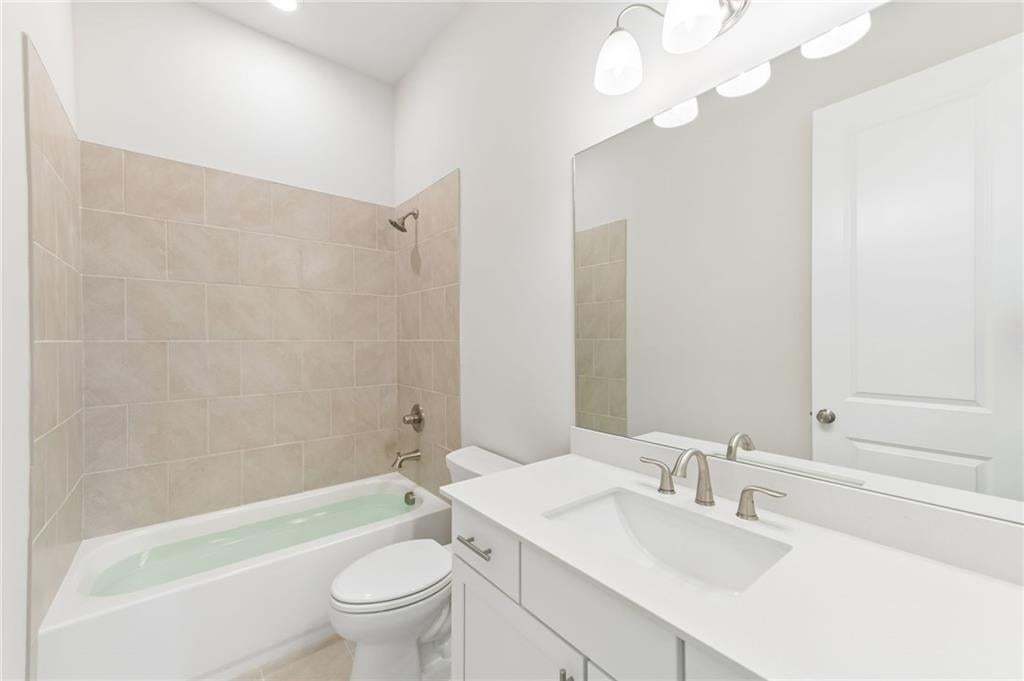 Secondary bathroom to service to front bedrooms.