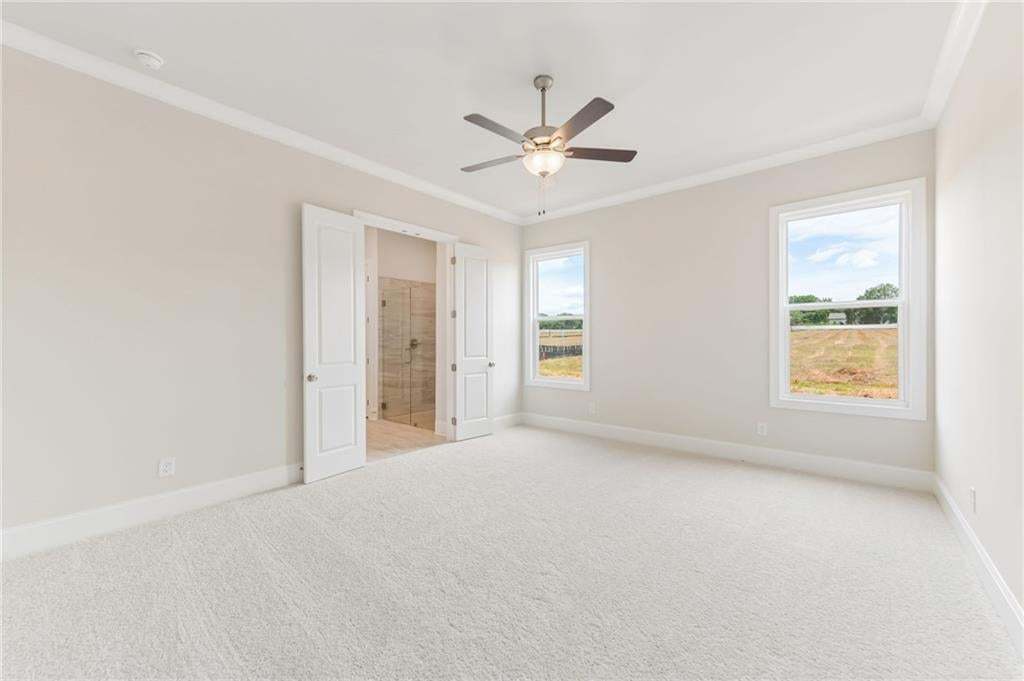 The Primary bedroom is spacious, located for privacy and will feature a walk-in closet and a beautifully tiled shower with double vanities.